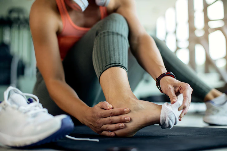 closeup athletic woman injured her foot during workout gym 637285 8520