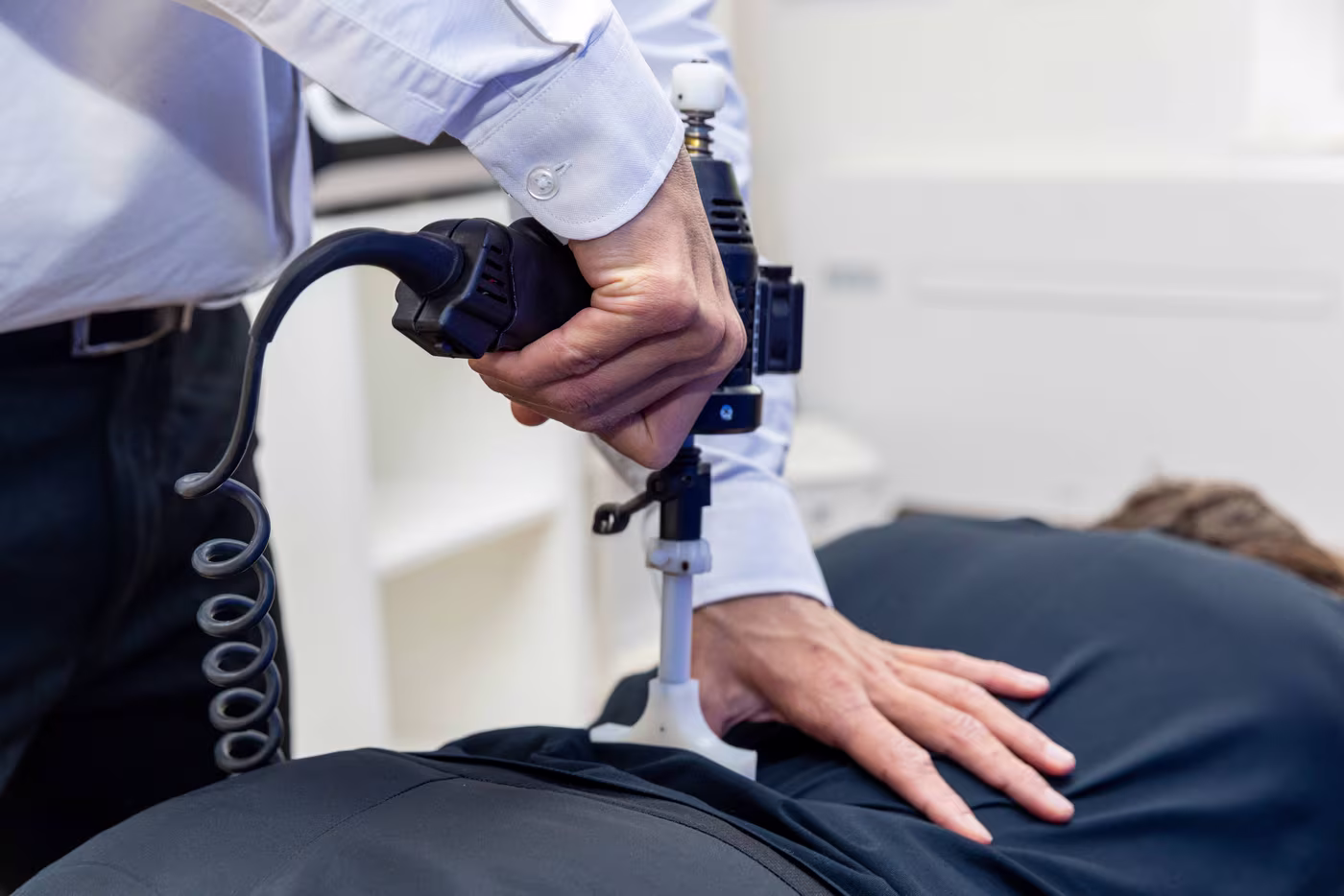 instrument assisted adjusting lumbar spine chiropractor